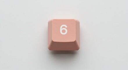 Close-up of a salmon-colored keyboard key with the number 6