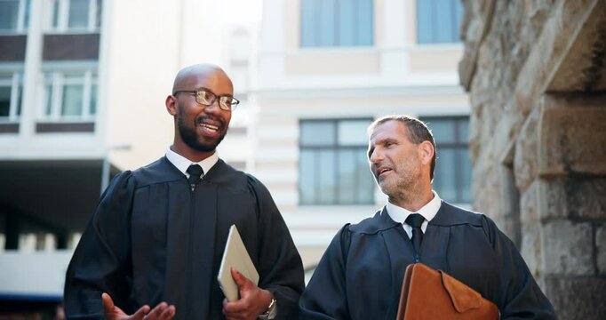 Judge, people and lawyer discussion in city for legal case collaboration, trial preparation or bail decision. Low angle, colleagues or walking by courthouse with litigation verdict planning or advice