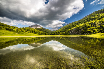 Tranquil Mountain Landscape with Water Reflections