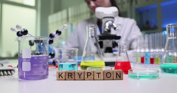 Engaging in the exploration of krypton within a laboratory setting filled with colorful liquids and advanced equipment