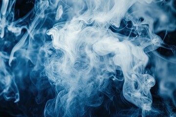 Abstract smoke swirls against a dark background