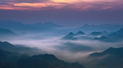 Fototapeta premium Breathtaking mountains enveloped in clouds and mist, valleys veiled, sunrise beauty captured in wide-angle, telephoto-lensed high-definition landscape.