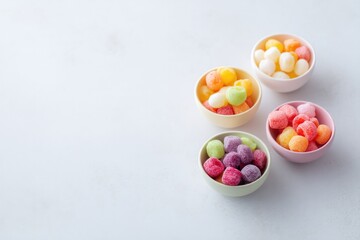 bright bowls of colorful children snacks scattered on pristine white table reflecting minimalistic aesthetic