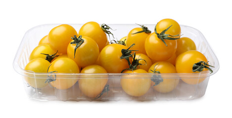 Ripe yellow cherry tomatoes in plastic container isolated on white