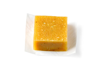 Bouillon cube unwrapped isolated on white background
