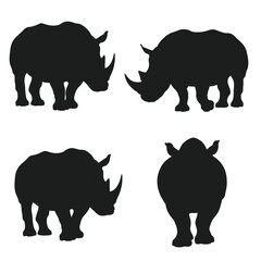 Herbivorous rhino standing silhouette on a white background. Wild peaceful rhino standing in different positions. Rhino full body silhouette collection. Dangerous rhinoceros silhouette bundle design.