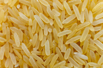 Macro close-up of brown rice in soft focus. Top view.