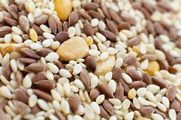 pile of sesame, flax and chickpea seeds. Macro shot of a salad dressing kit with healthy seeds