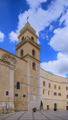 Obraz premium Glimpse of historic center of Gravina in Puglia, Apulia region in southern Italy: view of bell tower of cathedral.