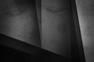 Old black concrete wall with abstract grunge texture, featuring aged cement surface, cracks, and...
