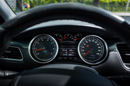 Car Dashboard with Warning Lights and Digital Display
