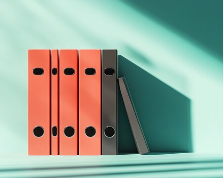 Stack Of Coral And Black File Folders On Mint Green Shelf
