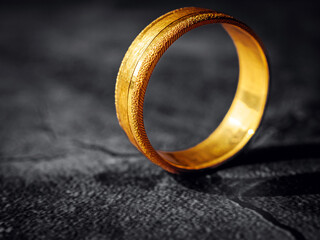 gold ring, gold price, gold jewelry, close up of gold ring on grey background
