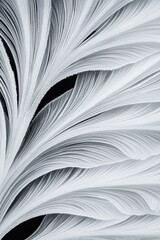 Abstract pattern of flowing lines in black and white.