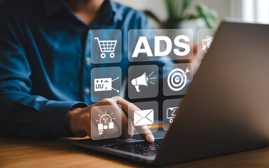 Digital marketing professional working on online advertising campaigns promoting brands using modern technology