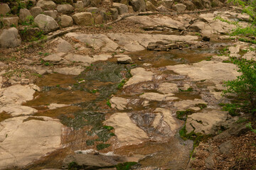 Natural rocky stream landscape in earthy tones representing tranquility and nature in South Korea, no person