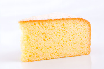 Slice of  homemade sponge cake or chiffon cake isolated on white background