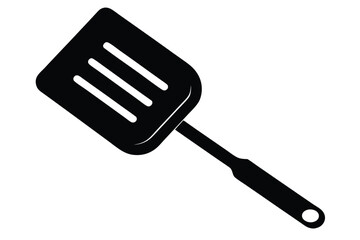 A simple black spatula with three slots is shown over a white backdrop