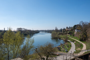 Fototapeta premium River landscape with historic buildings in Aschaffenburg, Germany