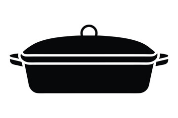 The covered black casserole dish with handles and lid is isolated on white