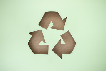 Recycle symbol on green background
