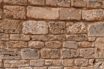 Fragment of the ancient stone fortress wall