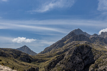 The Spanish island of Mallorca - beautiful views of green mountains, cliffs, the Mediterranean Sea...