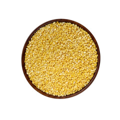 Indian yellow lentils called Moong Dal in wooden bowl isolated on white background