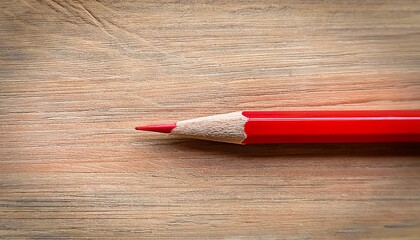 Obraz premium closeup red pencil point sharp graphite wood texture background art color macro image office supply detail design sketch