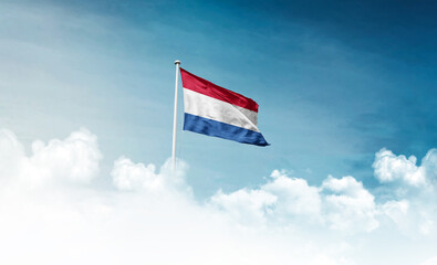 Netherlands national flag with mast waving in beautiful sky. Netherlands flag for Republic Day and...