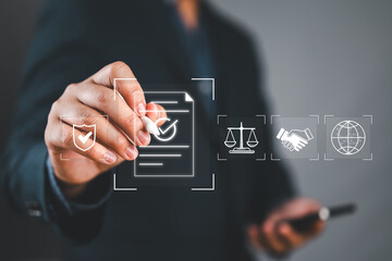 Digital compliance and legal agreement concept with Businessman selecting contract icon, representing online regulation, law, approval process, and secure global business operations.