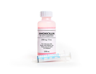 Amoxicillin oral suspension or liquid amoxicillin bottle with syringe. Fake label. Penicillin...