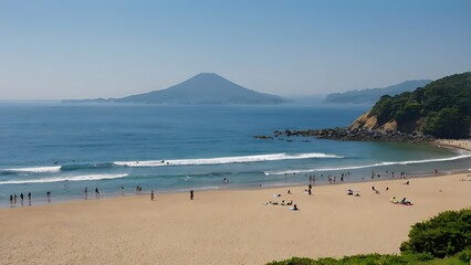 Fototapeta premium A serene beach scene with gentle waves, people enjoying the sun, and a distant mountain under a clear blue sky.