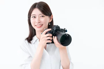 Fotobehang カメラを持つ女性 © naka