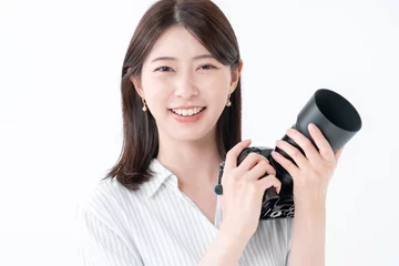 Fotobehang カメラを持つ女性 © naka