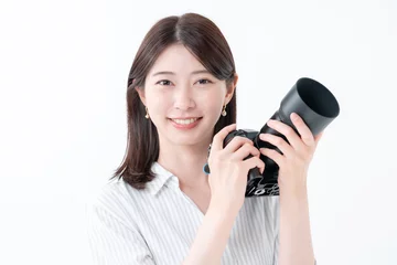 Fotobehang カメラを持つ女性 © naka
