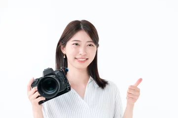 Fotobehang カメラを持つ女性 © naka