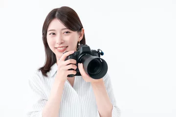 Fotobehang カメラを持つ女性 © naka