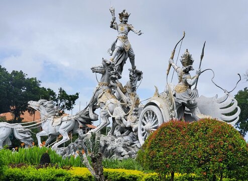 Bali, Indonesia - January 12, 2025 - The majestic chariot sculptures at Satria Gatotkaca Park, showcasing intricate details and powerful figures.