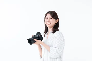 Fotobehang カメラを持つ女性 © naka
