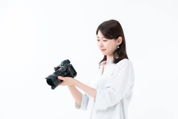 Fotobehang カメラを持つ女性 © naka