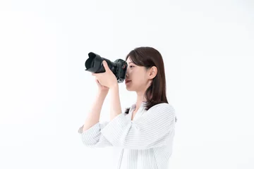 Fotobehang カメラを持つ女性 © naka