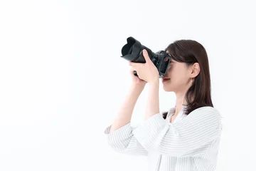 Fotobehang カメラを持つ女性 © naka