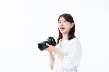 Fotobehang カメラを持つ女性 © naka