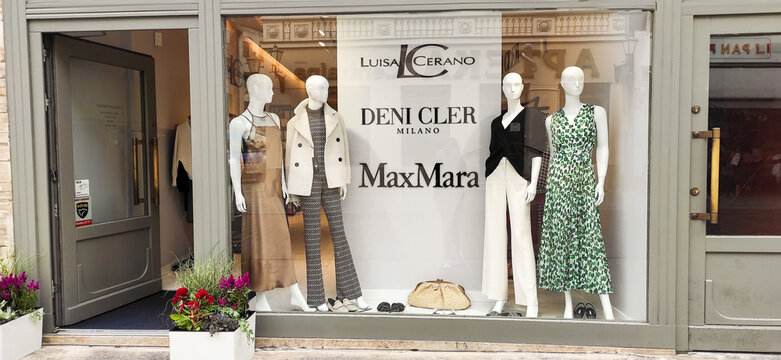 Poland, Bydgoszcz - August 25, 2023: Designer fashion storefront featuring mannequins and luxury brands from Luisa Cerano, Deni Cler Milano and MaxMara