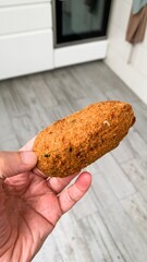 Rustic hand-formed falafel embraced by Mediterranean whimsy, celebrating Falafel Day and the...
