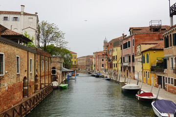 Old houses facades and channel in the old center of Venice, Italy