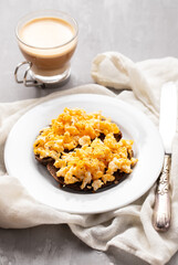 scramble eggs with black bread on dish