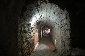 Obraz premium Underground tunnels of Stari grad Bar (Old Town of Bar), an ancient walled city overlooking the Adriatic Sea in Montenegro