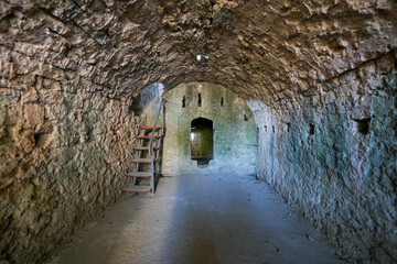 Obraz premium Underground tunnels of Stari grad Bar (Old Town of Bar), an ancient walled city overlooking the Adriatic Sea in Montenegro